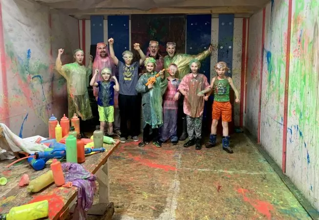 Young group in spatter room at Hidden Key Escape Room